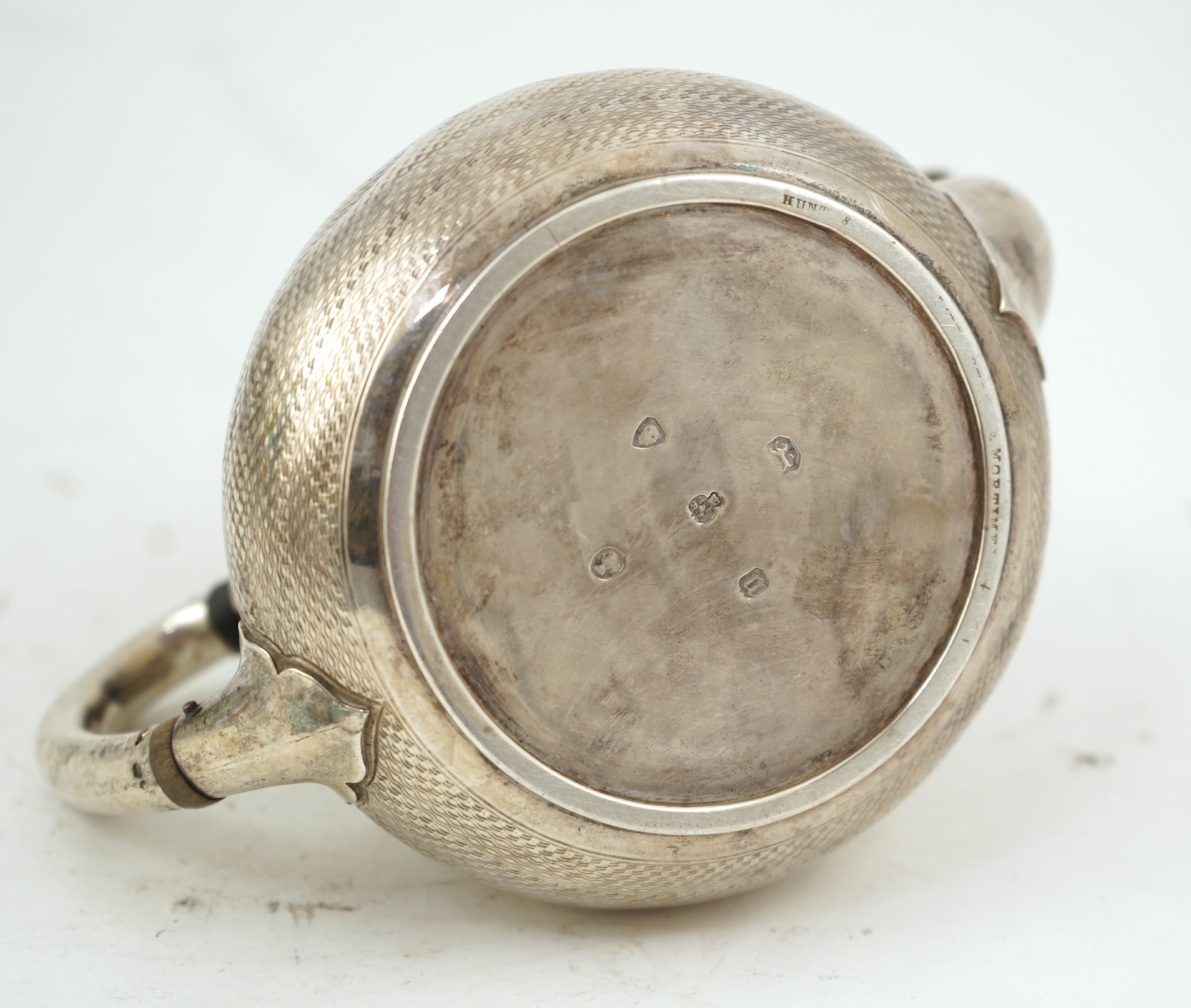 A Victorian engine turned silver teapot by Hunt & Roskell